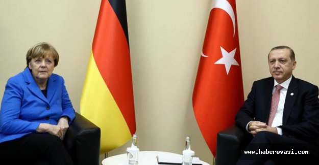 Merkel'den Erdoğan'a vize muafiyeti uyarısı