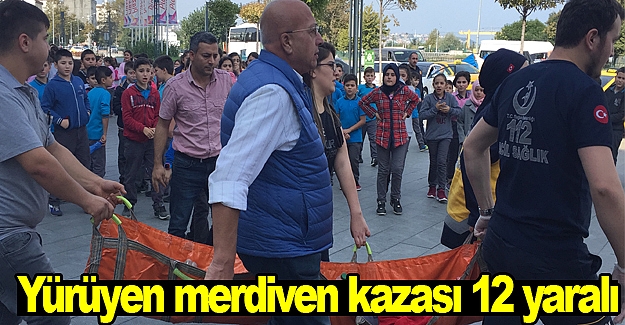 Alışveriş merkezinde yürüyen merdiven kazası:12 yaralı